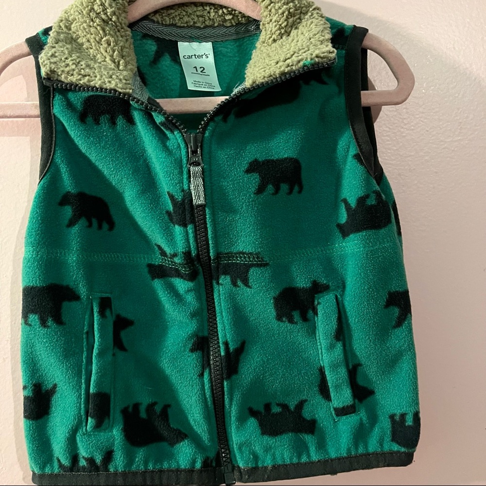 Green and black dinosaur zip up fleece vest . EUC